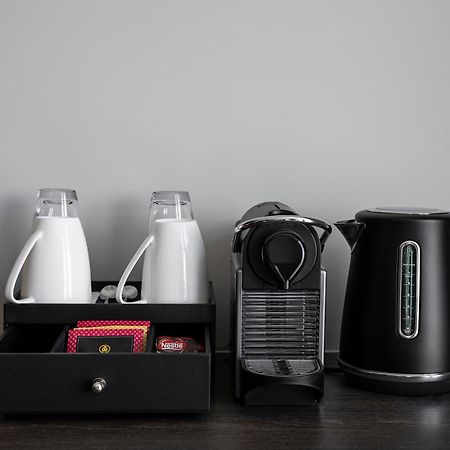 Oakwood Premier Melbourne Aparthotel Εξωτερικό φωτογραφία A Nespresso coffee machine in a hotel room